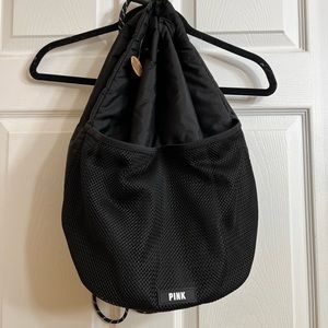 Pink black drawstring bag